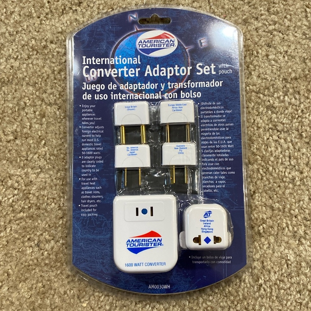 New in box American Tourister international adapter set with pouch
